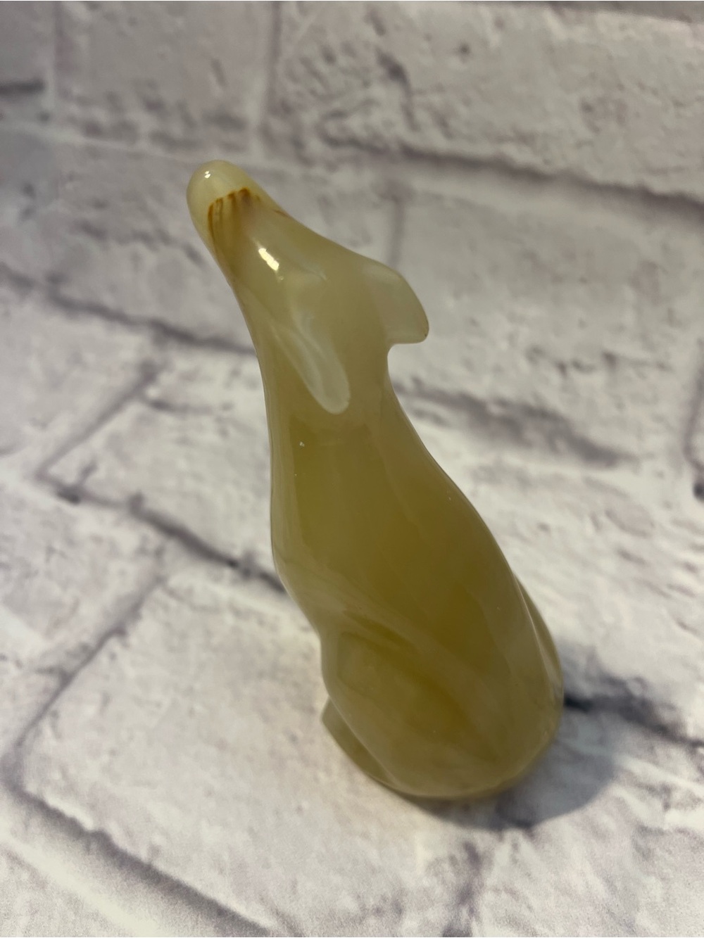 Vintage hand-carved banded onyx dog figurine
 5” tall